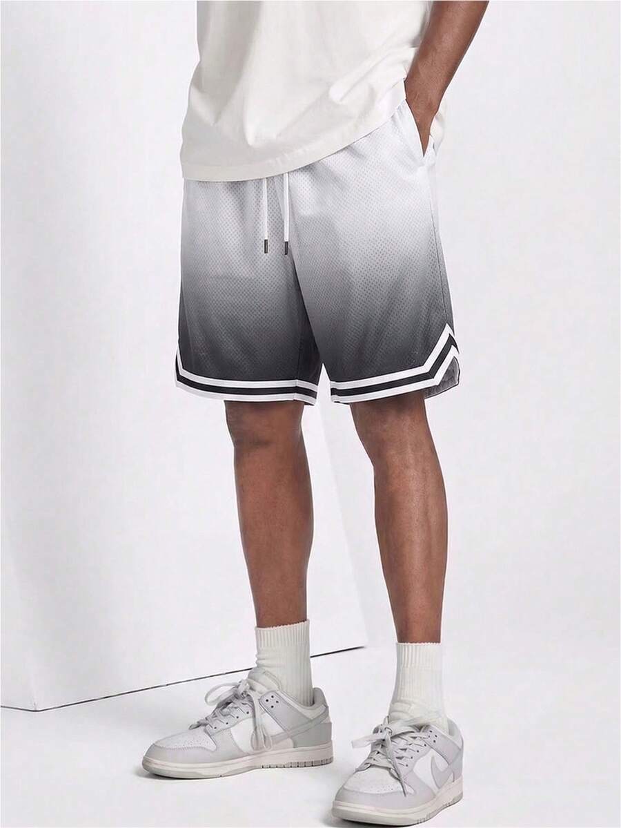 Pantaloncini da basket da uomo in rete sfumata, pantaloncini sportivi larghi, traspiranti e ad asciugatura rapida con tasche laterali e vita con coulisse, adatti per fitness estivo, corsa, spiaggia, casual - Bianco e nero - Visualizzare 1