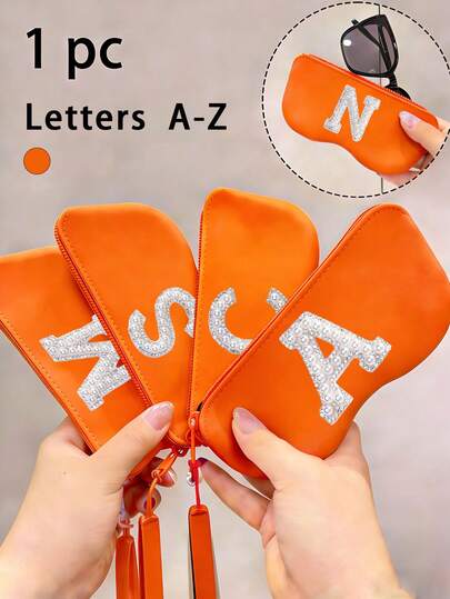1 Orange Silicone Zipper Glasses Case With Pearl Initials A-Z Printed On It, With A Hanging Rope, Suitable For Travel And Portable Use. Fashion Glasses Dust-Proof Organizing Box, Made Of High-Quality Silicone Material, Waterproof And Shockproof, Specially Designed For Glasses And Fashion Glasses To Prevent Dust From Entering. Suitable As A Gift, Mother's Day Gift, Holiday Gift For Daughters, Girlfriends, And Wives.