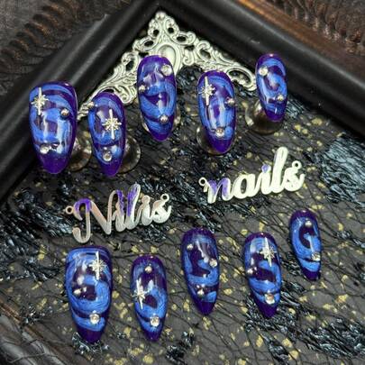 10pcs Almond Nail Acrylic Kit, Royal Blue Nails, Royal Blue Tie Dye, Hand Drawn Blue Rotating Asymmetric Wave Texture, Smooth Lines With A Sense Of Blending, With A Casual Cool Feeling, 3D Silver Beads&Eight Pointed Stars And Other Nail Accessories, Echoing The Night Sky&Starlight Theme, The Overall Style Tends To Be Cyberpunk Style, With Cool Tones