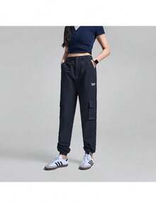 Adidas Originals 女式长裤 2026 春季新款时尚运动休闲锥形裤腿工装裤复古口袋慢跑裤 GD3071 - 黑色 - 查看 5