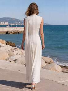 Đầm dạ hội dài không tay cổ tròn thanh lịch dành cho nữ, thiết kế xếp ly ở gấu đầm, dây đeo vai, chất liệu vải có họa tiết. - Màu be - Xem 3