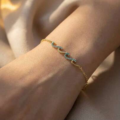 1条波西米亚风蓝色锆石波浪纹不锈钢链手链，海洋元素设计配饰，适合旅行、海滩、度假佩戴，也是送给女孩的礼物。