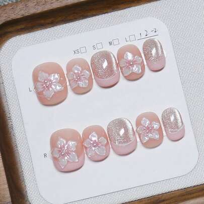 10片春夏低饱和度粉色手绘樱花浮雕美甲贴纸，可爱甜美短款可卸假指甲，适合女性和女孩作为时尚配饰礼物