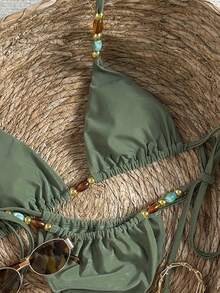 Bộ bikini màu xanh ô liu đính hạt cườm - Áo tam giác thanh lịch và quần buộc dây bên hông với điểm nhấn ngọc trai | Hoàn hảo cho kỳ nghỉ biển và những chuyến đi nghỉ mát mùa hè ở vùng nhiệt đới - màu xanh lá - Xem 4