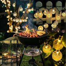 Dây đèn LED năng lượng mặt trời chống thấm nước 1 cái, 20/50/100 bóng, dài 5m/7m/12m, 8 chế độ sáng, đèn chùm pha lê trang trí ngoài trời, sân vườn, hiên nhà, tiệc tùng (ánh sáng trắng ấm), thích hợp trang trí mùa xuân, hè và thu, nhà cửa, ngoài trời, trang trí cho gia đình, sân vườn, cần thiết cho cắm trại và tiệc nướng ban đêm, đám cưới, đèn trang trí, đồ dùng ngày của mẹ, đồ dùng ngày của cha. - Nhiều màu - Xem 2