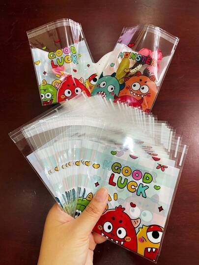 100个可爱卡通图案礼品包装OPP自封袋，粉蓝格子印花小礼品卡装饰袋，适合主题派对、促销、送礼等场合。