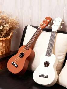 Đàn Ukulele gỗ bóng, di động, 21 inch, phù hợp cho người mới bắt đầu. Bộ dành cho người lớn bao gồm phụ kiện (1 dây đeo có dây rút, 1 bộ dây dự phòng, 1 túi đựng, miếng gảy, khăn lau, kẹp capo). Lý tưởng cho các buổi tiệc sinh nhật và lễ hội, lựa chọn tuyệt vời trước khi nâng cao kỹ năng chơi guitar, cần thiết cho các bữa tiệc ngoài trời, cắm trại và các trò chơi tương tác. - Nhiều màu - Xem 4