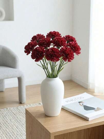 仿真康乃馨——逼真的丝绸花朵，拥有栩栩如生的花茎。这些高度仿真的花朵用途广泛，是家居装饰、情人节礼物、酒店、派对、婚礼、餐桌摆饰（包括五一节花饰）、新娘捧花和墓地花圈的理想之选。能够提升家居、花园、婚礼和派对的氛围。