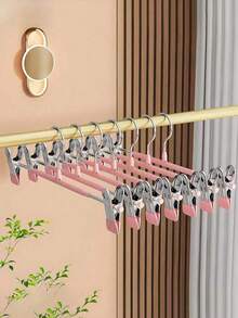 10 pièces Cintres essentiels pour la maison pour les porte-pantalons, solution de rangement pour armoire, pinces à pantalons sans couture robustes pour séchage intérieur et extérieur, pinces à jupes, support de rangement pour vêtements, cintres à pantalons, organisateur de placard pour chambre, cuisine, buanderie, dortoir, accessoires de rangement gain de place, outils de soin des vêtements pour usage quotidien et stockage à la maison - Voir 7