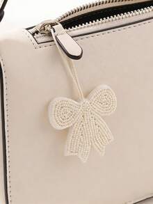 1 chiếc móc khóa túi hình nơ đính cườm thủ công, phong cách Bohemian, làm từ vải không dệt, phù hợp cho trang phục thường ngày, đi biển, du lịch của nữ, làm quà tặng Ngày của Mẹ. Hình dáng thủ công có thể có một vài khác biệt nhỏ. - trắng - Xem 2