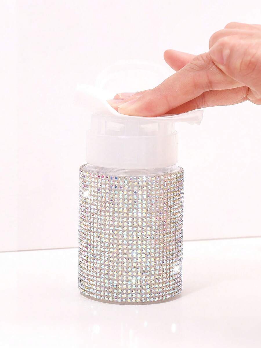 Chai nước tẩy sơn móng tay màu hồng và trắng với thiết kế hình kim cương và nắp nhấn tiện dụng. Dụng cụ chăm sóc móng: Chai đựng sơn móng tay bằng nhựa với thiết kế họa tiết kim cương, có thể đổ đầy lại, chai nước tẩy sơn móng tay có nắp nhấn. - Nhiều màu - Xem 1