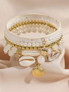 Bộ 7 vòng tay xếp lớp bằng vỏ sò, ngọc trai và hạt cườm, thiết kế phong cách Boho có thể xếp chồng lên nhau, thích hợp cho nữ, đi biển, nghỉ mát, họa tiết vỏ sò ngẫu nhiên, ý tưởng quà tặng tuyệt vời (Số lượng hạt cườm không cố định theo chiều dài). - bộ vòng tay - Xem 2