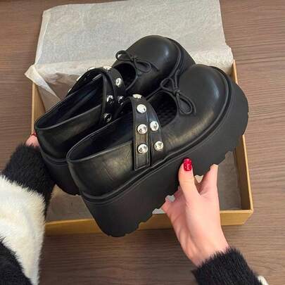 Giày lười nữ thời trang thường ngày, kiểu dáng đế dày, trang trí nơ, đính đinh tán.