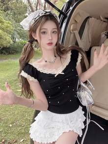 韩版甜美少女蕾丝边撞色仿珍珠针织上衣，浪漫街头风短袖蝴蝶结修身纯黑色针织上衣，适合约会、日常穿着、音乐节穿搭，也是情人节、复活节和夏季的理想之选。 - 黑色 - 查看 5
