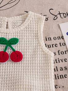 女婴夏季新款两件套：时尚华夫格纯色流苏卡通水果樱桃贴片装饰无袖圆领上衣和短裤套装，适合户外穿着 - 杏色 - 查看 10