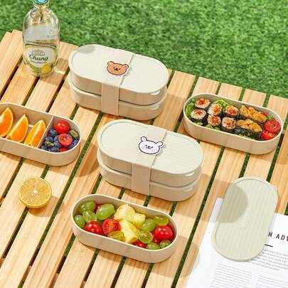 Bộ 2 hộp cơm trưa bằng nhựa có thể xếp chồng, chia ngăn, dung tích 730ml, hộp bento hình bầu dục di động có thể tái sử dụng với dây đeo hình hoạt hình dễ thương, hộp đựng trái cây, salad, thực phẩm để chuẩn bị bữa ăn và kiểm soát khẩu phần, hộp đựng cơm dùng được trong lò vi sóng, phù hợp cho học sinh và người lớn sử dụng tại nhà, trường học, ký túc xá, văn phòng, cắm trại ngoài trời, dã ngoại, du lịch, mang cơm trở lại trường.