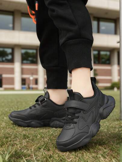 1 Pair Kids Shoes, New Spring Children's Sneakers, Solid Black PU Patchwork Thick Sole Little Black Shoes, Low-Top Hook And Loop, Elementary School Boys & Girls Campus Casual Shoes, Street & Outdoor Running Training Shoes, Suitable For Children's Day, Spring Festival, Easter, Labor Day And Other Holidays