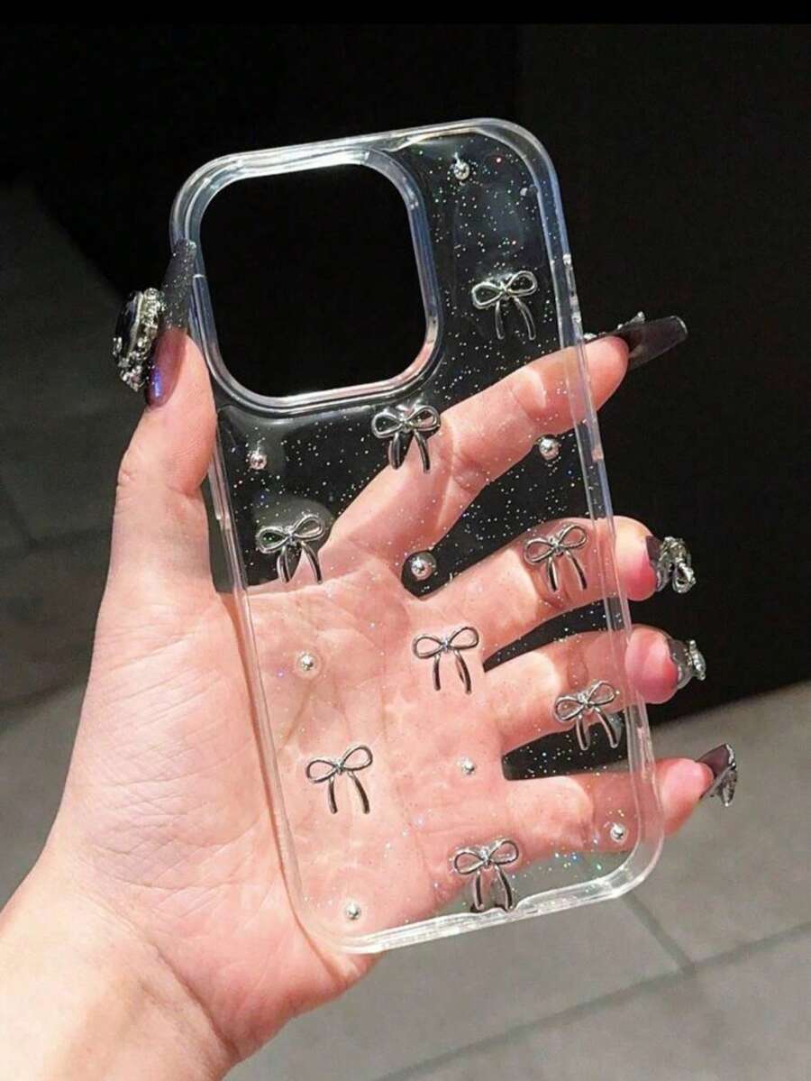 Etui na telefon z kokardką, 1 szt., modne, brokatowe, przezroczyste, DIY, z metalowymi koralikami w kształcie kokardy w kolorze srebrnym, kompatybilne z 17/17 Pro/17 Pro Max/Air/16/16 Pro/16 Plus/16 Pro Max 15/15 Pro/15 Plus/15 Pro Max/14/14 Pro/14 Plus/14 Pro Max/13/13 Pro/13 Pro Max/13 Mini/12/12 Pro/12 Pro Max/12 Mini/11/11 Pro/11 Pro Max/X/XS/XR/XS Max/7/8/7 Plus/8 Plus, minimalistyczne, stylowe etui ochronne na telefon DIY w kształcie kokardy - Srebro - Zobacz 1