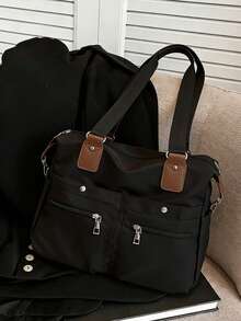 2024新款时尚经典百搭纯色大容量多口袋撞色手提包，适合校园出行。这款学院风背包容量大、防水、轻便易携，经典休闲，适合少女、女性、大学生，是返校、开学第一天、初中生、高中生的理想之选，也是女士必备手提包和大学必备单品。 - 黑色 - 查看 2