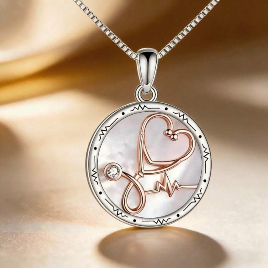 Dây chuyền hình trái tim màu vàng hồng có hình ống nghe và máy đo điện tâm đồ. - Hoa hồng vàng - Xem 1