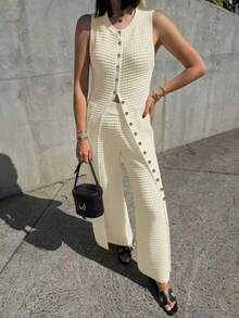 Conjunto de mujer de cárdigan sin mangas de punto hueco y pantalones largos, de unicolor, elegante, con botones, de estilo urbano. Adecuado para salidas, viajes, citas y uso diario. - Crema - Ver 2