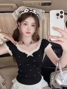 韩版甜美少女蕾丝边撞色仿珍珠针织上衣，浪漫街头风短袖蝴蝶结修身纯黑色针织上衣，适合约会、日常穿着、音乐节穿搭，也是情人节、复活节和夏季的理想之选。 - 黑色 - 查看 4