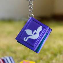 Móc khóa đồ chơi hình cuốn sách mini dễ thương, có thể ấn bằng ngón tay - Đồ chơi lật trang 3D giúp giảm căng thẳng, đồ trang trí treo ba lô, đồ chơi cảm giác giúp giảm lo âu. - Nhiều màu - Xem 9