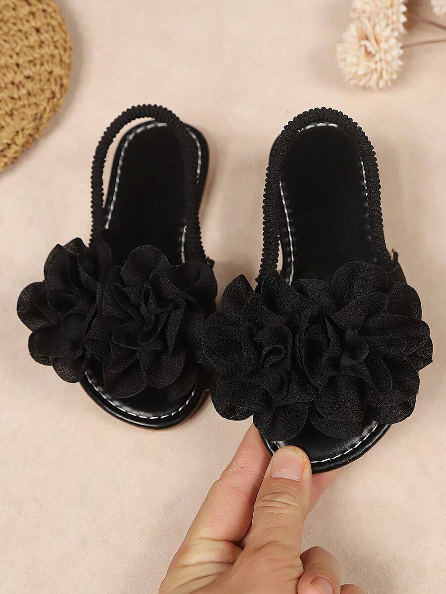 1 Pair Girls' Flat Sandals, Solid Soft Fabric With 2 Peony Flower Decor, Round Toe Open Toe Soft Non-Slip Elastic Back Strap Design, Fashionable Bohemian Casual Holiday Style, Cute Princess Beach Sandals, Suitable For Daily, Festival, Party, Campus, Spring/Summer New Arrival - Black - View 1