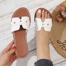 Sandal đế bằng nữ, đính đinh tán, kiểu dáng slip-on, quai chéo, thích hợp cho kỳ nghỉ. - trắng - Xem 10