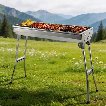 Faltbarer Metall-Barbecue-Grill / Rauchfreier Holzkohle-Grill für den Außenbereich / Tragbarer Barbecue-Ständer für Zuhause