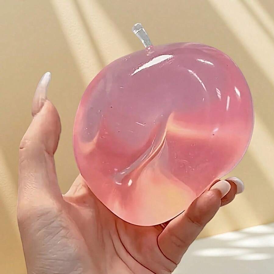 This Crystal Apple Features Soft Hues, An Ultra-Thin Skin, And A Smooth, Soft Texture. It Functions As Both A Squeezeable Stress-Relieving Ball And A Tactile Sensory Toy. Perfect For Displaying On A Desk, It Also Makes An Excellent Stress-Relieving Office Gift. - 粉色 - 查看 1