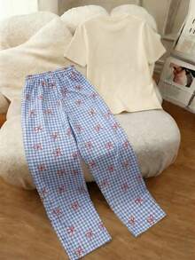 罐头鱼印花宽松短袖上衣搭配格子蝴蝶结长裤套装，休闲两件套，印花图案，女士套装，夏季度假，旅行服装，海滩风，简约度假装，海岛度假氛围，夏季穿搭灵感 - 杏色+蝴蝶格 - 查看 3