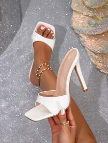 Mẫu sandal cao gót màu trắng mới mùa hè 2026 dành cho nữ, kiểu dáng thoải mái, hở mũi, dễ xỏ, quai trong suốt, gót mỏng, phù hợp phối cùng váy. - trắng - Xem 1