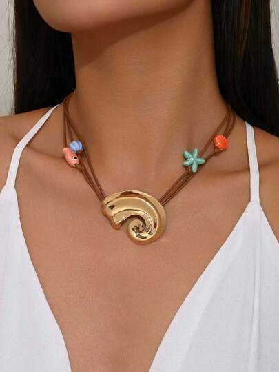 1 chiếc vòng cổ mặt dây chuyền hình vỏ sò phong cách Bohemian gợi cảm với cá hồng, sao biển xanh, sò điệp cam, hoa xanh trắng, vỏ sò kim loại vàng, thích hợp cho kỳ nghỉ hè ở bãi biển, tiệc tùng, dã ngoại của phụ nữ. Chất liệu gốm được nung ở nhiệt độ cao, những khuyết điểm nhỏ là hiện tượng bình thường và sẽ không ảnh hưởng đến vẻ đẹp của nó. Hãy yên tâm mua hàng.