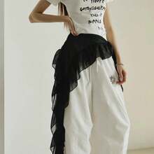 1 chiếc váy ngắn xòe xếp tầng có thắt lưng và tua rua, thích hợp cho các buổi khiêu vũ đường phố, hộp đêm, vũ trường, lễ hội, tiệc tùng và các dịp biểu diễn khác. Váy trang trí tua rua đa năng. - Nhiều màu - Xem 9