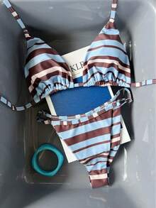 Bộ bikini kẻ sọc cổ yếm thời trang dành cho nữ, với thiết kế hở lưng dễ thương và chi tiết buộc dây phía sau tạo vẻ ngoài quyến rũ cho kỳ nghỉ biển. - Nhiều màu - Xem 8