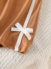 Bộ 2 món áo thun ngắn tay và quần legging kiểu dáng tối giản thường ngày cho bé gái, có nơ ruy băng, thích hợp cho mùa hè. - Cà phê nâu - Xem 7