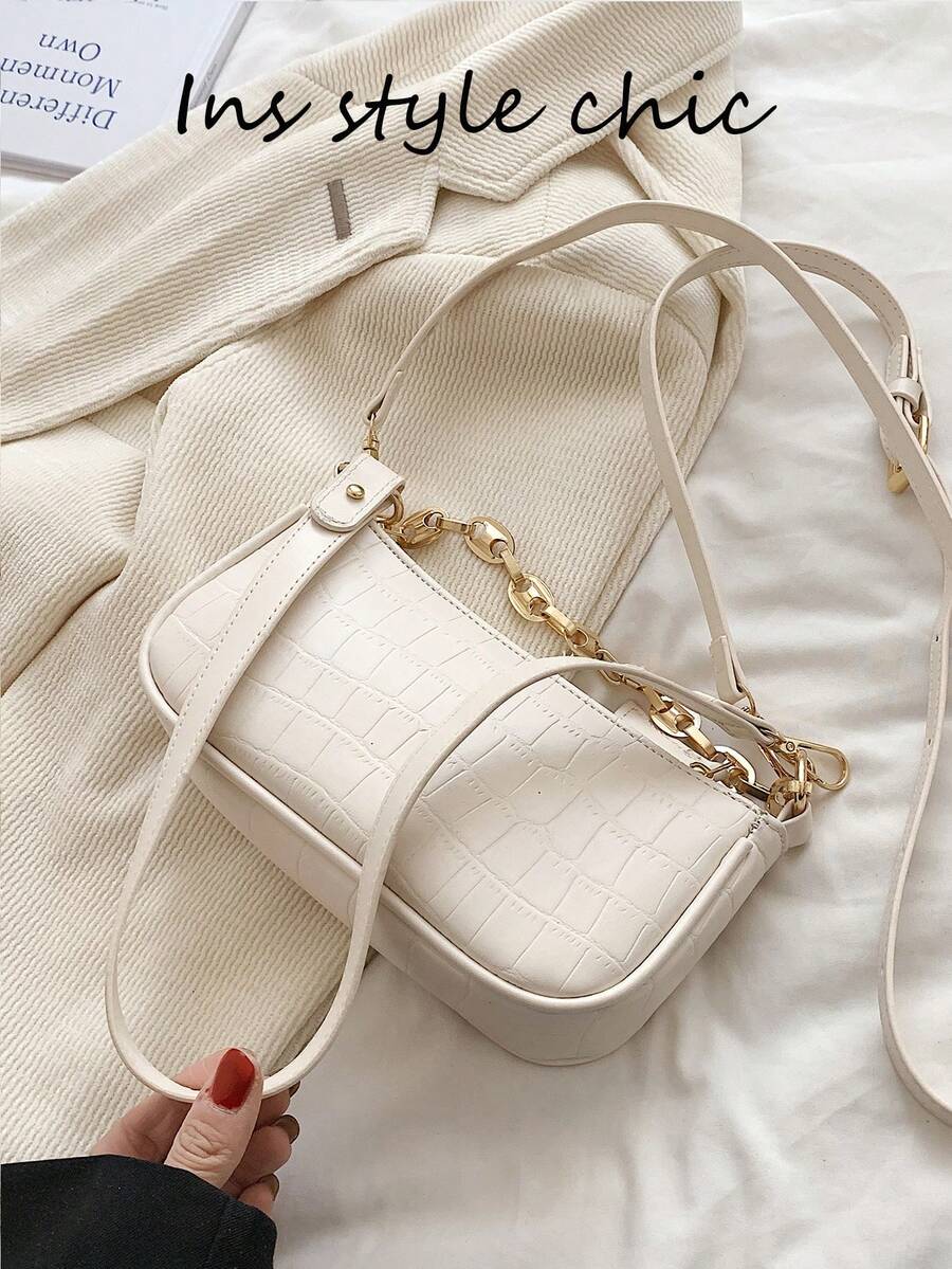 新款时尚经典小丑图案PU防水M字母印花设计金属链条装饰法棍单肩包，适合购物