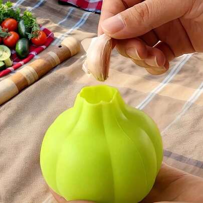 1 cái dụng cụ bóc vỏ tỏi bằng silicon hình củ tỏi sáng tạo, dụng cụ bóc vỏ tỏi mềm mại.