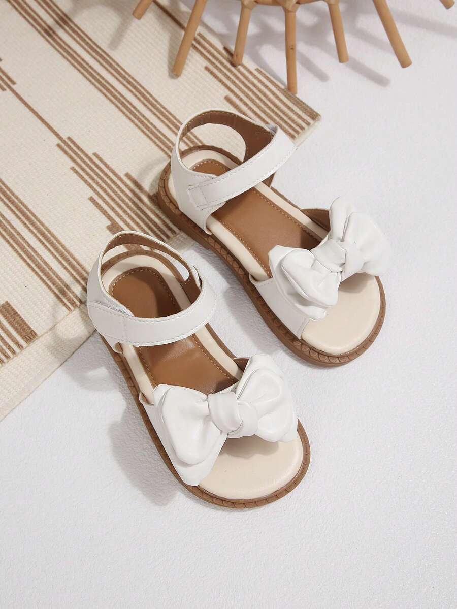 Sandalias con lazo blanco para niñas pequeñas, sandalias de verano para playa con punta abierta y correa ajustable, suela suave antideslizante, lindas sandalias de princesa para niños pequeños - Blanco - Ver 1