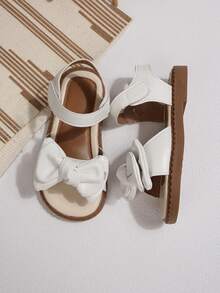 Sandalias con lazo blanco para niñas pequeñas, sandalias de verano para playa con punta abierta y correa ajustable, suela suave antideslizante, lindas sandalias de princesa para niños pequeños - Blanco - Ver 6