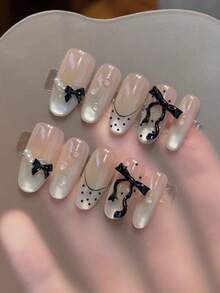 10片纯手工制作美甲贴片，长款杏仁甲，黑色甲片，酷炫甜美富家女风，裸色猫眼波点法式黑色3D蝴蝶结珍珠装饰，温柔精致，适合女性和女孩，春夏秋冬节日派对及日常生活使用。 - 黑色 - 查看 1