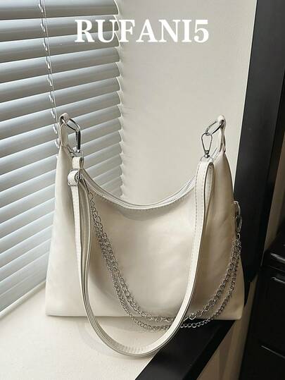 时尚新款纯色大容量链条装饰个性手提包，经典百搭实用女士斜挎包，通勤必备，适合购物、携带钱包，适合年轻女性、大学生、职场新人及白领人士。也非常适合办公室、大学、工作、商务、通勤、户外活动、旅行和郊游等场合。