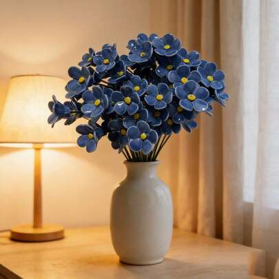 6/10 手工编织陶瓷勿忘我花摆件。可水洗，易于清洁，永不褪色，是经久耐用的家居装饰品，适合室内外使用。是情人节、圣诞节和母亲节的理想礼物之选。也适用于节日装饰、室内装饰和艺术家居摆设。