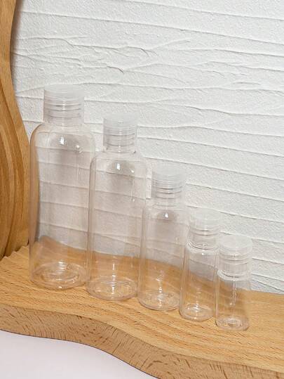 5 chai nhựa trong suốt có nắp bật tiện dụng khi đi du lịch, đựng toner, kem dưỡng da, nước rửa tay không cần tráng lại.