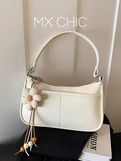 1个女士纯色PU新月形单肩包，时尚拉链法棍包，适合通勤、购物和送礼。