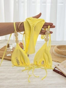Conjunto de bikini de mujer con cuentas y cuello halter - Traje de baño de dos piezas amarillo con Bottom atada a los lados para verano y vacaciones en la playa - Amarillo - Ver 2