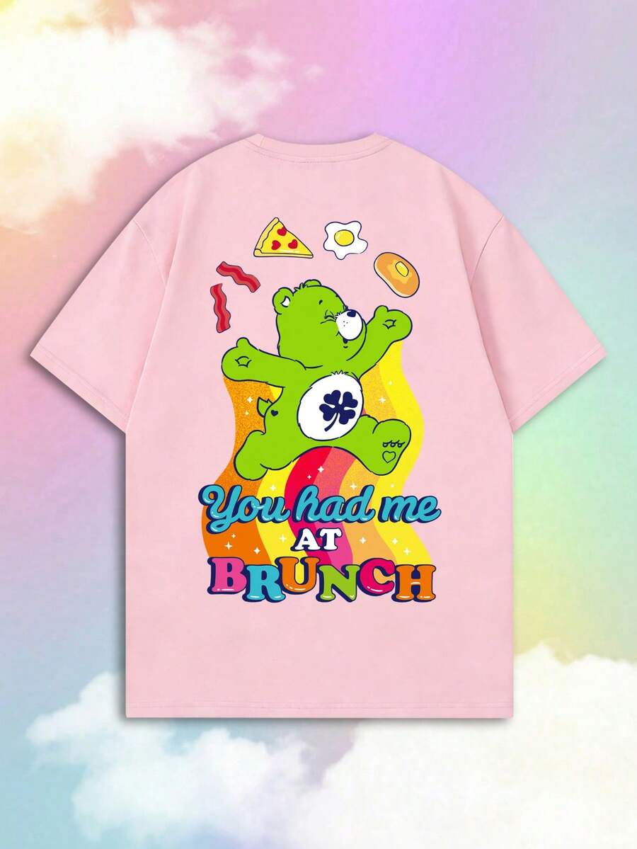 SHEIN | Care Bears Áo thun nữ tay ngắn mùa hè cổ điển in hình gấu xanh hoạt hình vui nhộn, kết hợp giữa phong cách ngọt ngào, thư giãn và thẩm mỹ retro Mỹ, thiết thực cho việc đi lại hàng ngày, phù hợp cho các buổi đi chơi của các cô gái, dã ngoại mùa hè, cuộc sống sinh viên, check-in mua sắm, chợ theo chủ đề, kỳ nghỉ ngắn ngày, thư giãn ngày lễ và hơn thế nữa, một chiếc áo tay ngắn giúp tạo nên trang phục giúp trẻ trung hơn. - Hồng - Xem 1