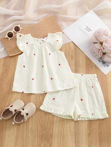 Bộ 2 món mùa hè cho bé gái, áo tay ngắn thêu hình trái tim, hàng mới về, gồm áo và quần short viền bèo nhún, thích hợp cho mùa hè. - Màu be - Xem 1