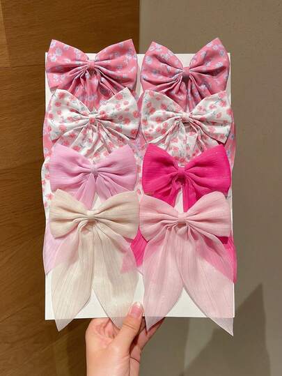 8个女士新款时尚布艺蝴蝶结发夹，可爱侧刘海半扎发夹，适合日常和正式场合发型、派对、演出、约会、海滩度假，也是很棒的礼物选择。